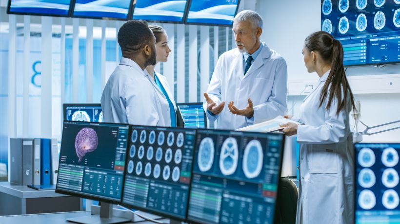 Doctors discussing brain scans