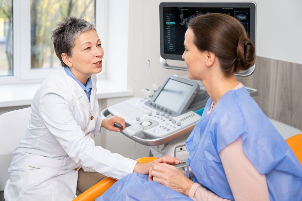 woman speaking with gynecologist