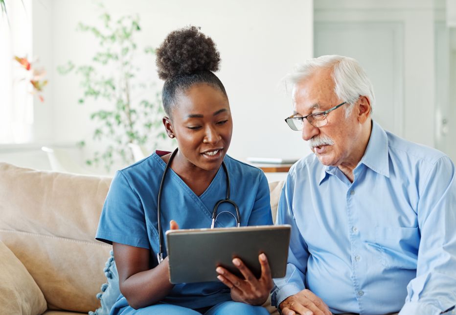 older man discussing options with doctor